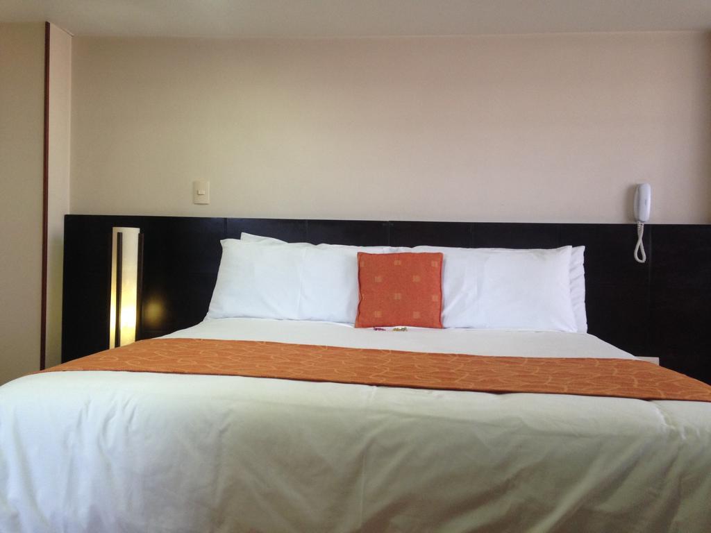 Hotel Plaza Muisca Tunja Szoba fotó